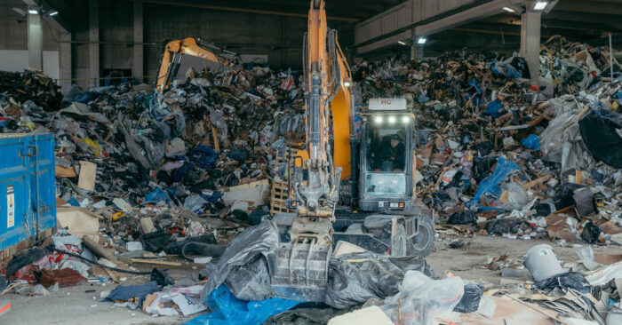 At Syklo, preliminary waste sorting is done using an excavator. 